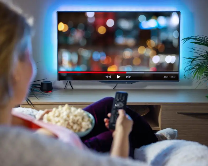 Custom home cinema and media room in a Gold Coast home with large screen, in-ceiling speakers, LED ambience and concealed cabling